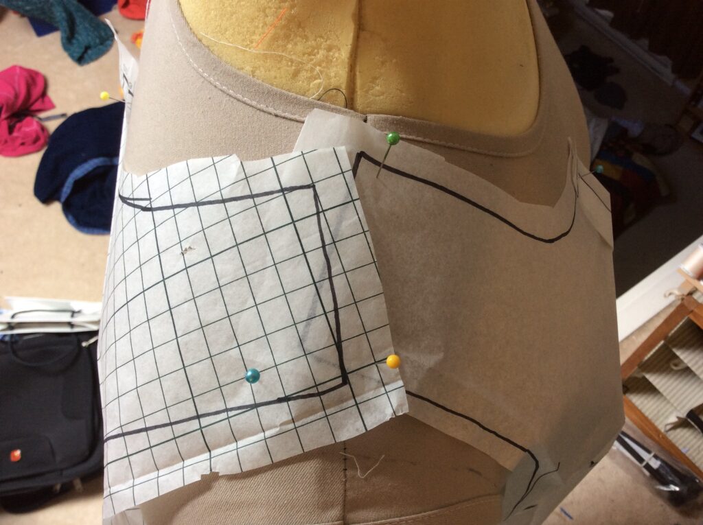 What's with the shoulder seams not being aligned? I have the pattern pieces pinned to my centre front and back on the straight grain.